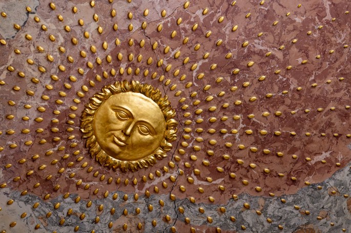 Golden sun in marble